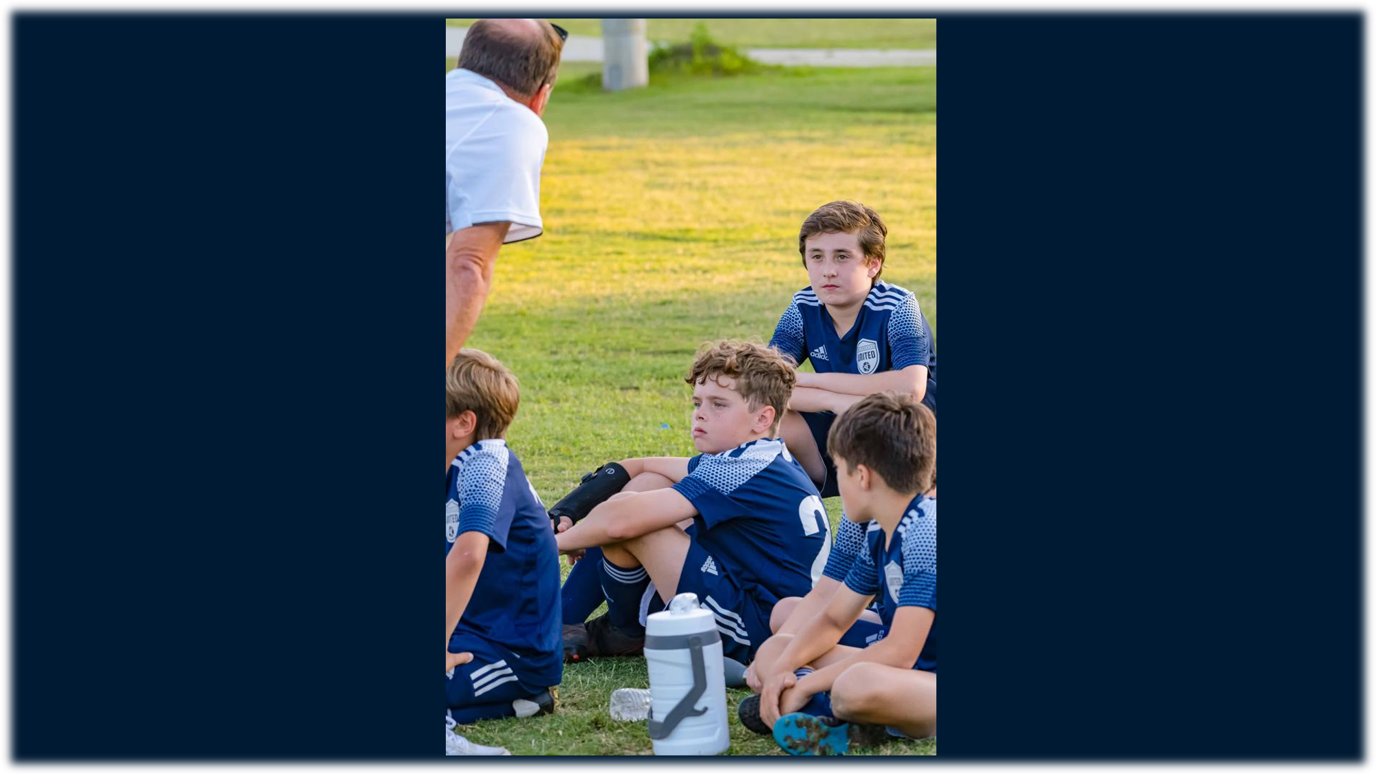 Academy players pose with their technical trainers